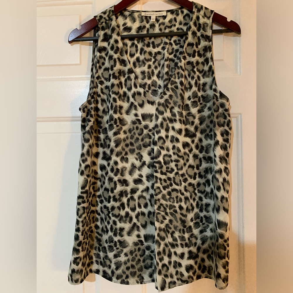 Cute top polyester versatile. *** Looks more grey than tan it shows in photos!